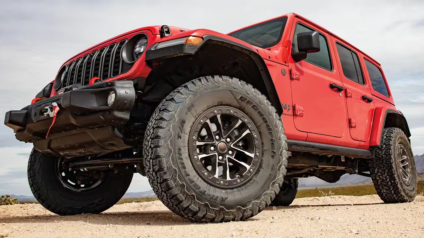 Red Jeep Wrangler offroading