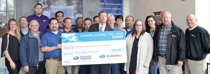 Center Subaru Staff Presents Check to NW CT YMCA for $63k