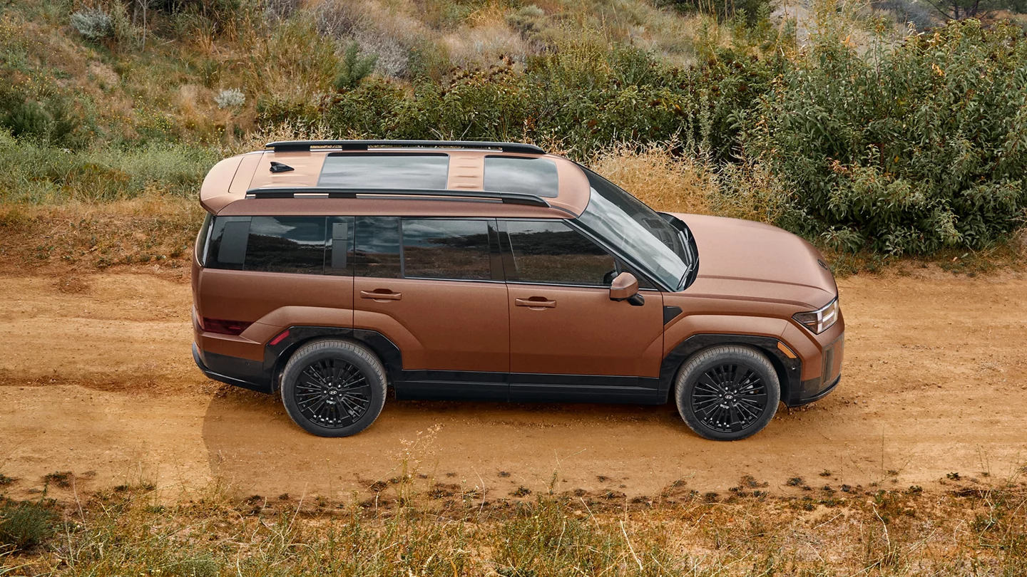 2025 Hyundai Santa Fe Hybrid driving through the desert