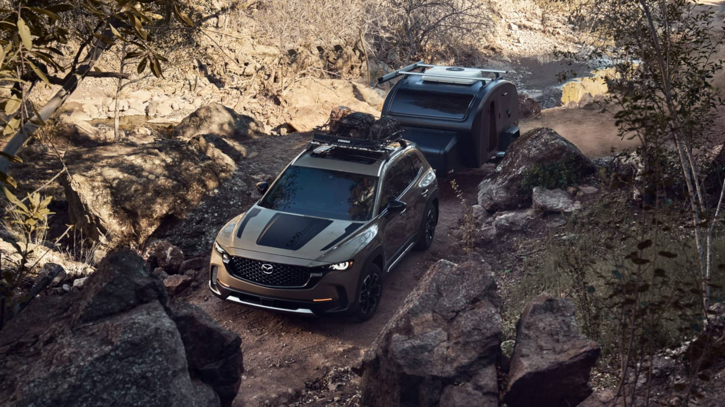 2025 Mazda CX-50 towing a camper