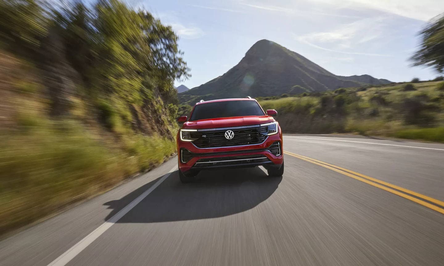 2025 Volkswagen Atlas driving around a corner