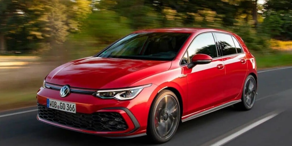 Volkswagen-golf.jpg 2024 Volkswagen Golf driving down the road
