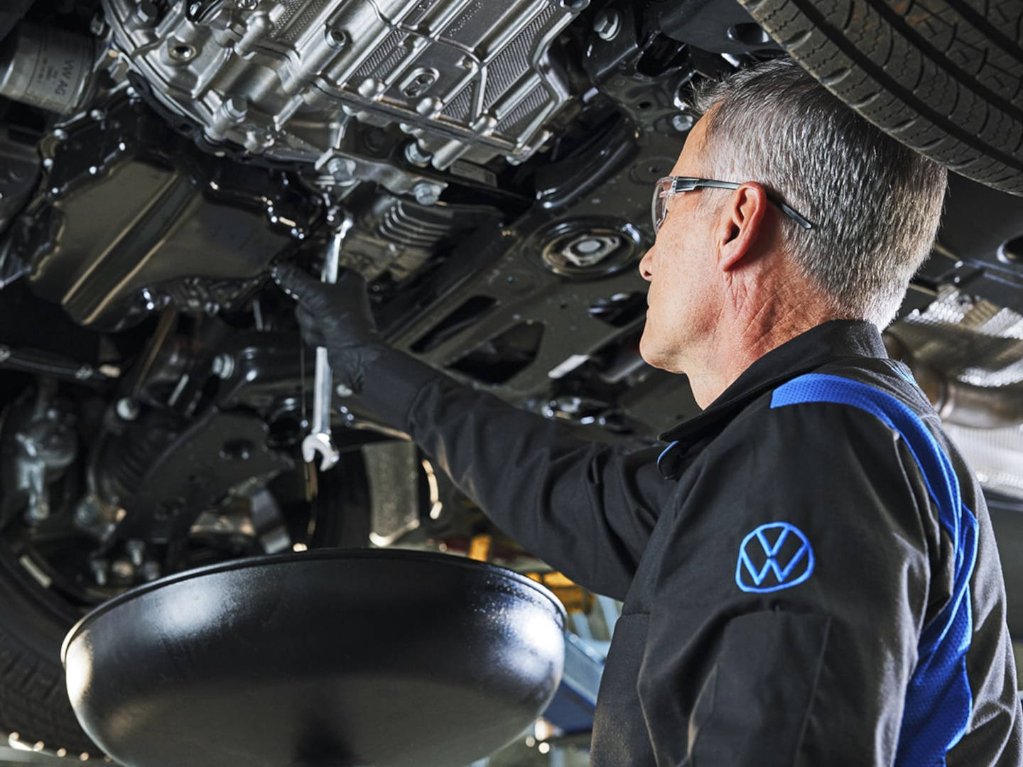 mechanic servicing a Volkswagen