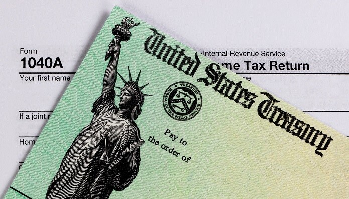 Tax%20Refund%20Down%20Payment.jpg A customer using their tax return to secure a great used car loan for a used car in Vermont.