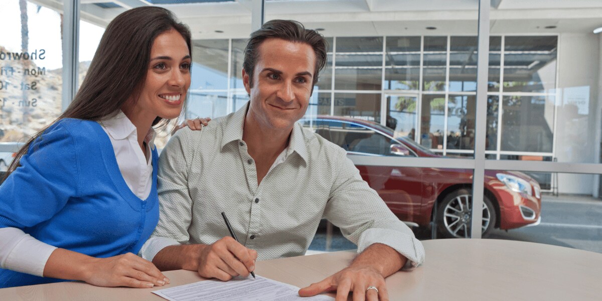 AutoNation Financing Couple applying for auto financing through AutoNation