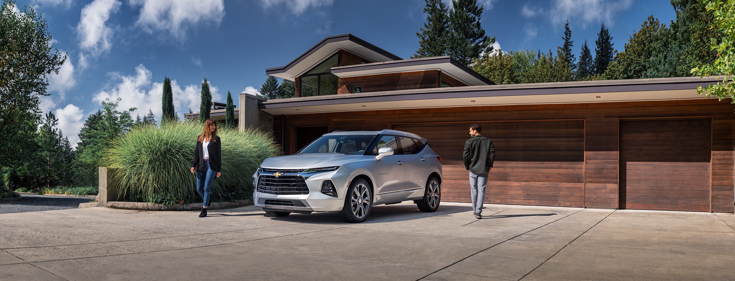 Chevrolet of New Bern is a Car Dealership in New Bern near Grantsboro NC | Silver 2020 Chevrolet Traverse in driveway