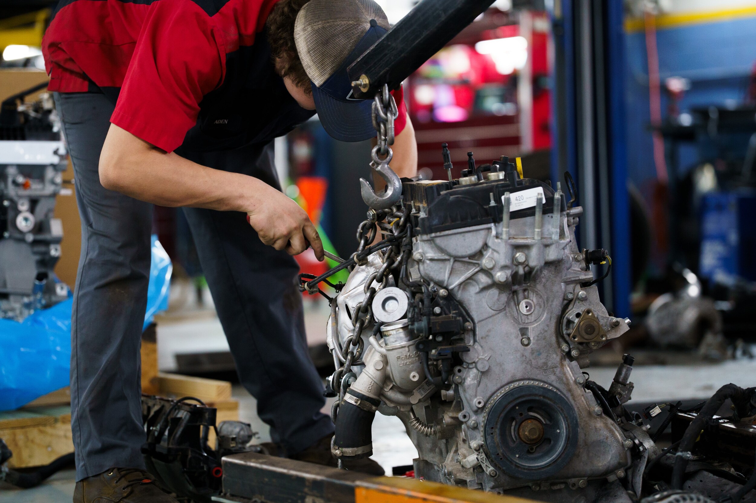 Ford technician working in a dealership service department