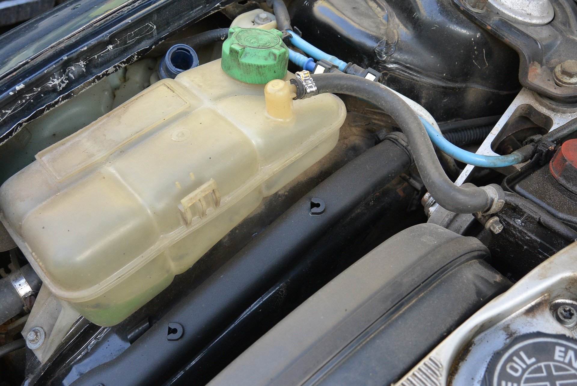 Adding manufacturer-specified coolant to a fully cooled vehicle