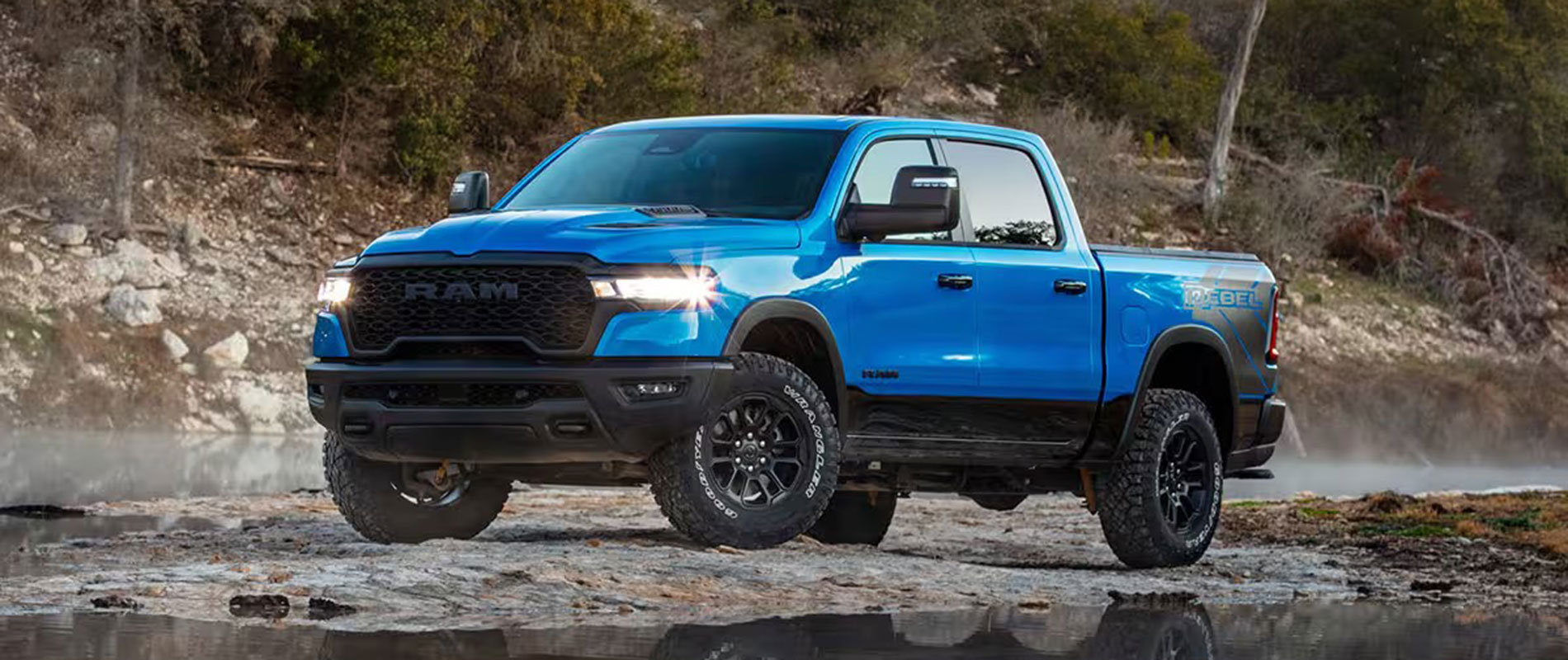 2026 CDJR Trim Comparisons RAM 1500 parked on the bank of a stream