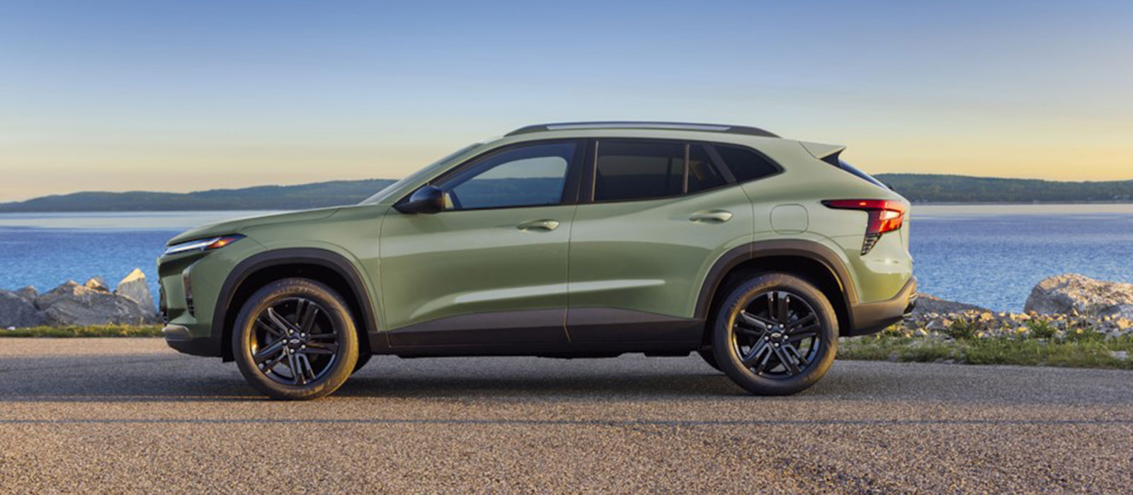 2025 Chevrolet Trim Comparisons 2025 Chevy Trax parked along the ocean