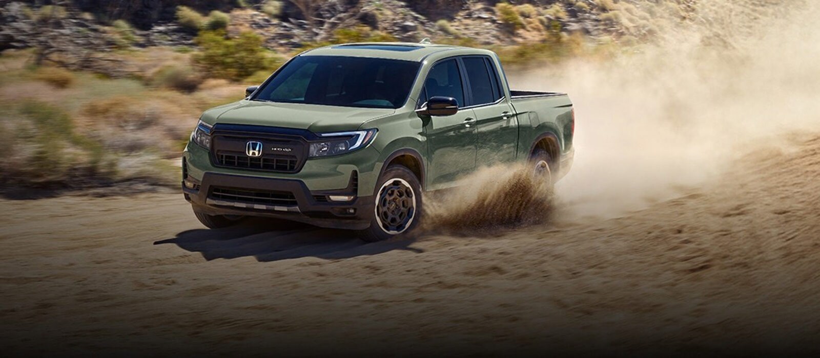 2026 Honda Ridgeline Trim Comparison 2026 Honda Ridgeline driving on sand