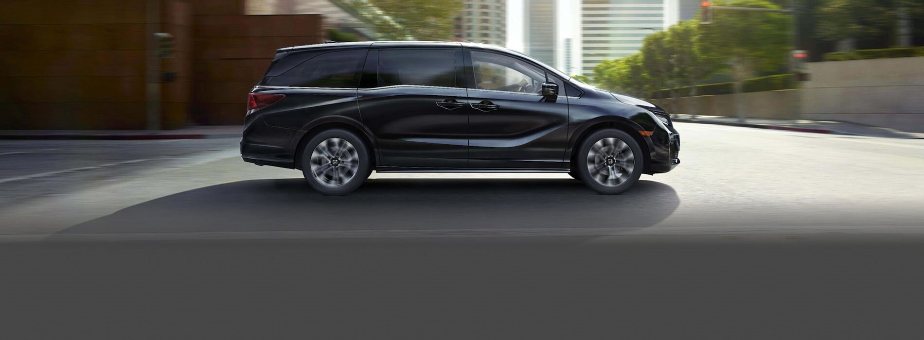 2026 Honda Odyssey 2026 Honda Odyssey driving on an empty street