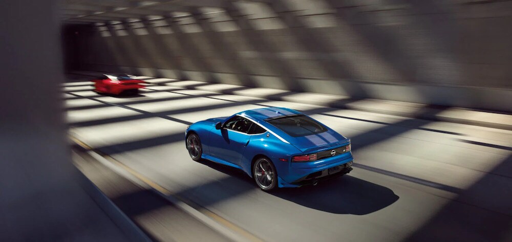 A blue 2026 Nissan Z sports car on the road A blue 2026 Nissan Z sports car on the road