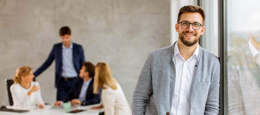 Smiling man in office setting