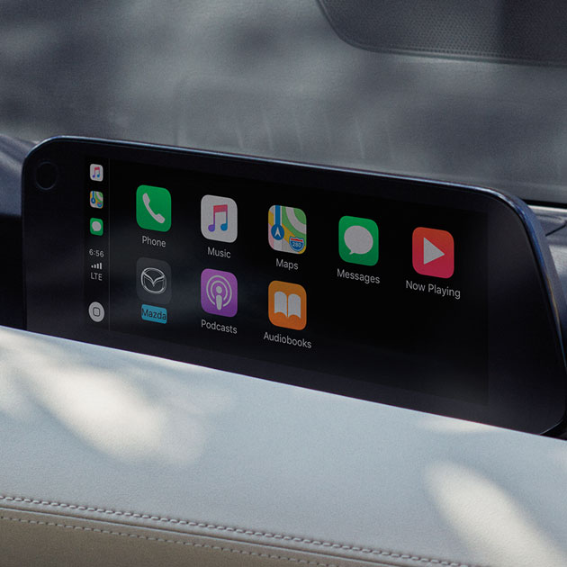 YOUR WORLD. AT YOUR FINGERTIPS. Apple CarPlay Integration