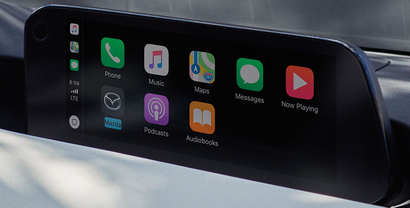 YOUR WORLD. AT YOUR FINGERTIPS. Apple CarPlay Integration