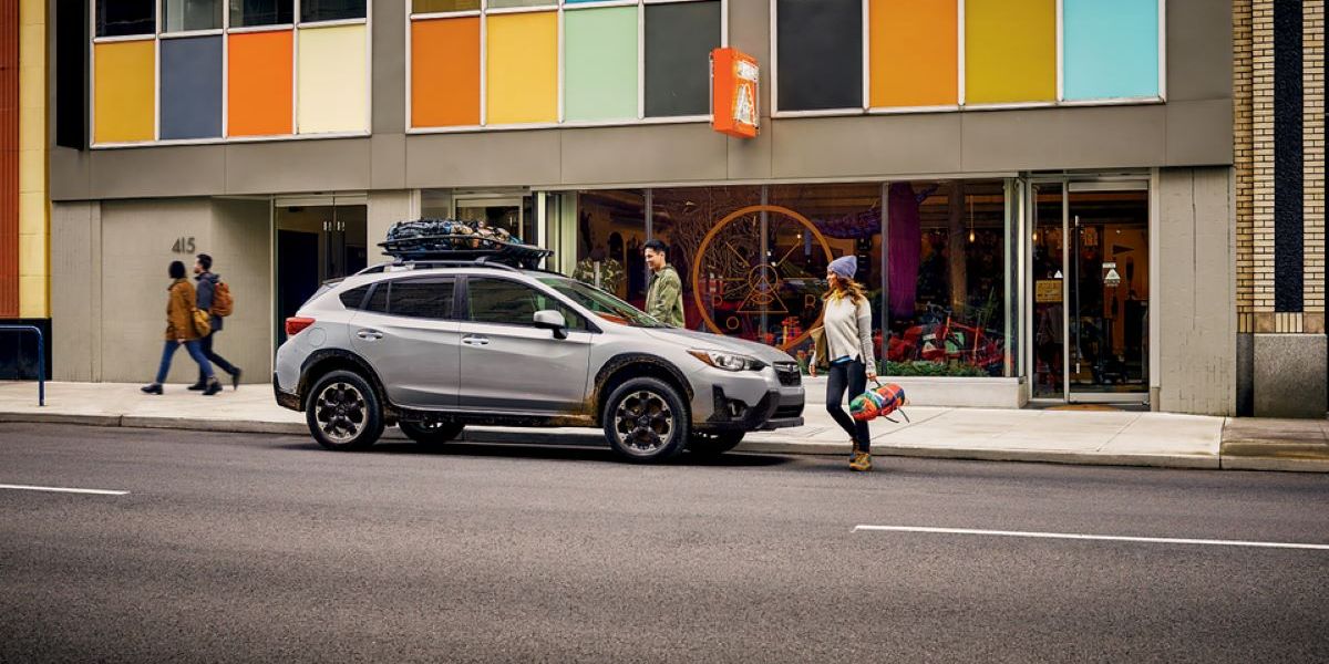 2021 Subaru Crosstrek Premium Hatchback parked by multicolored building on city street_res.jpeg