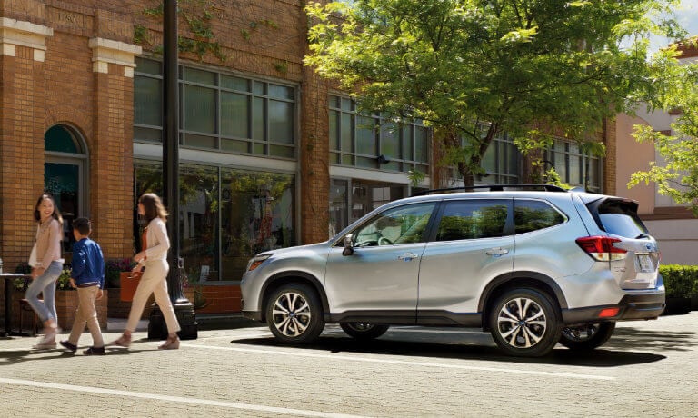 2021 Subaru Forester parked outside a shop