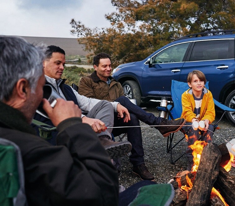 2021 Subaru Ascent Family Around a Campfire