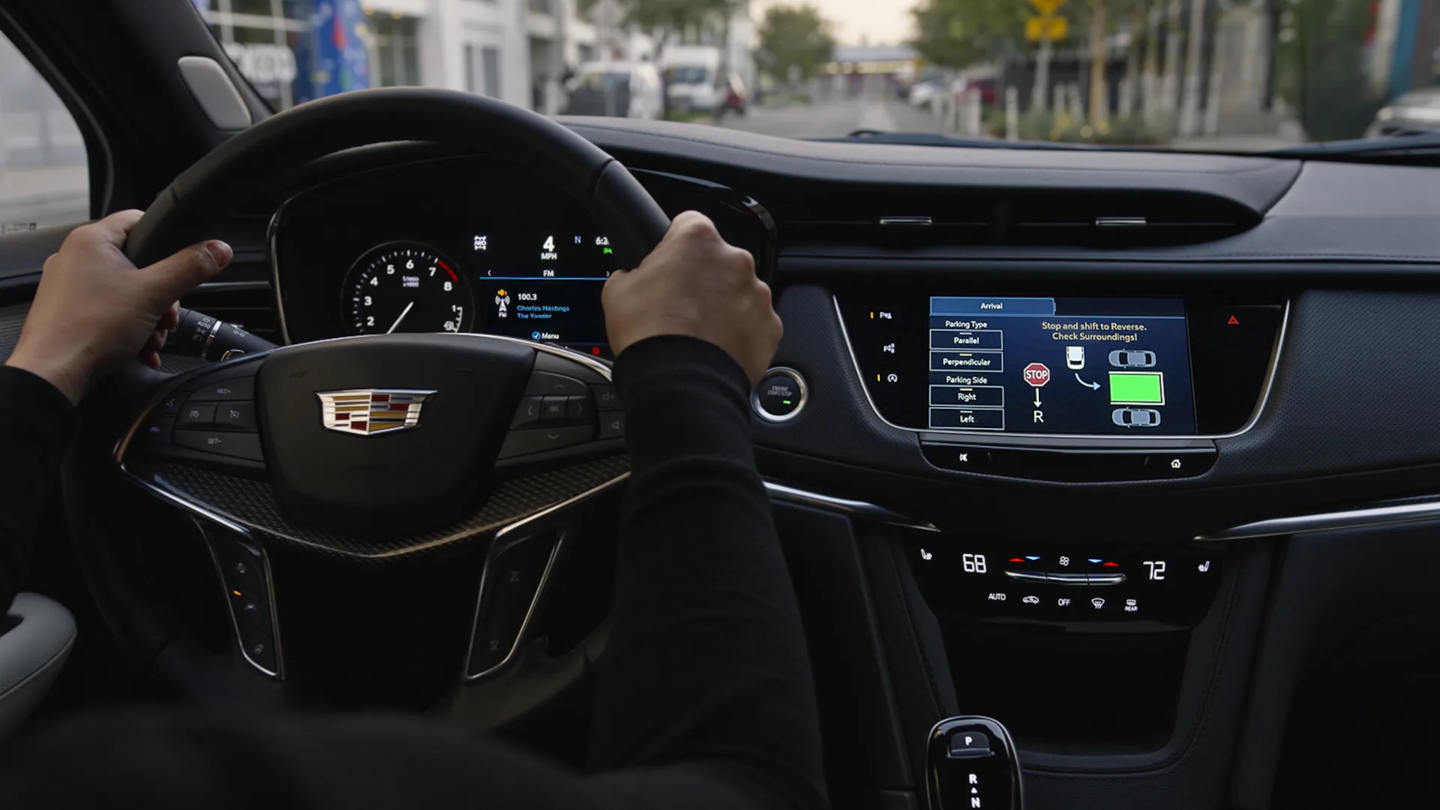 Cadillac Enhanced Automatic Parking Assist on dashboard