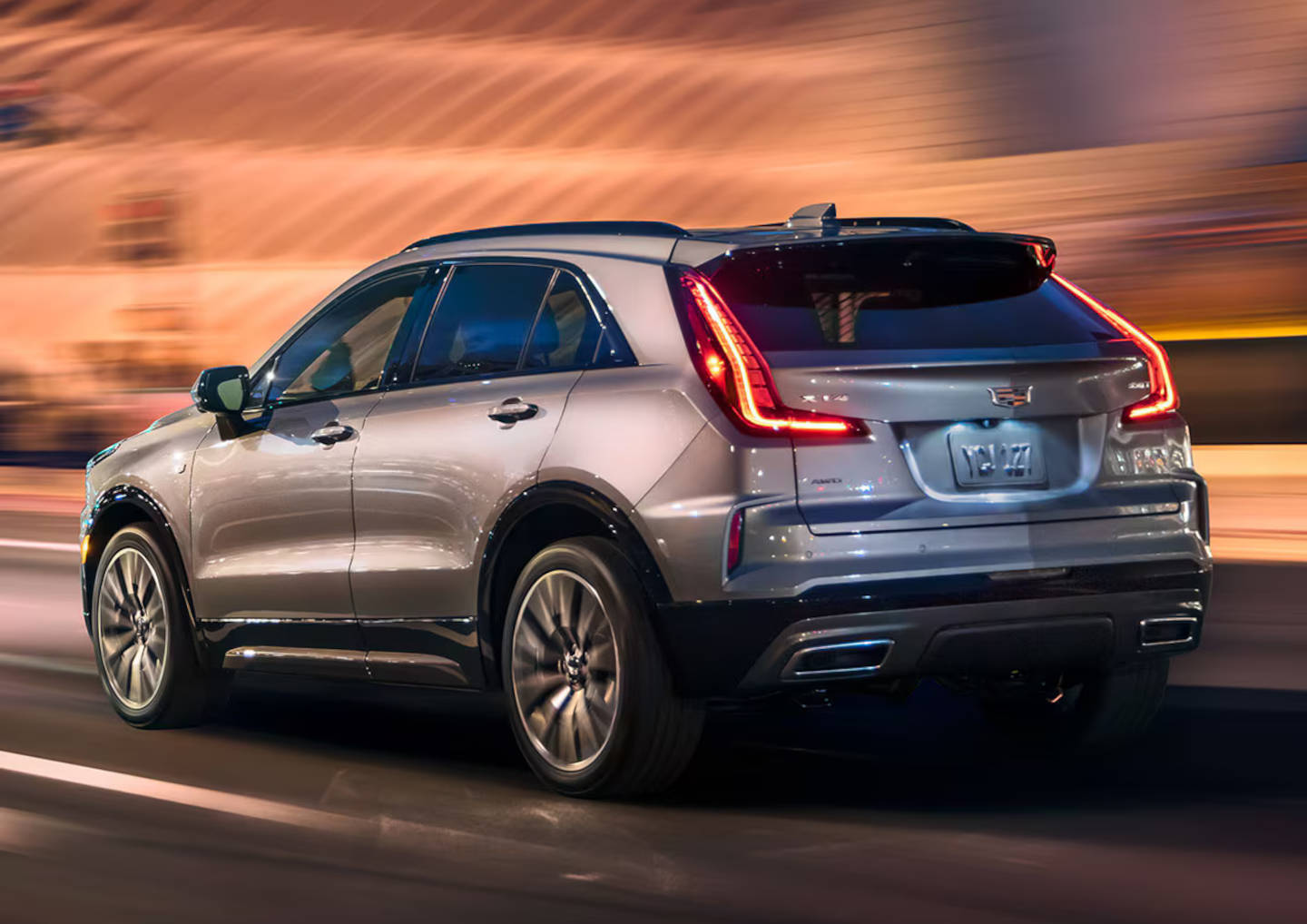 2025 Cadillac XT4 Sport driving rear view