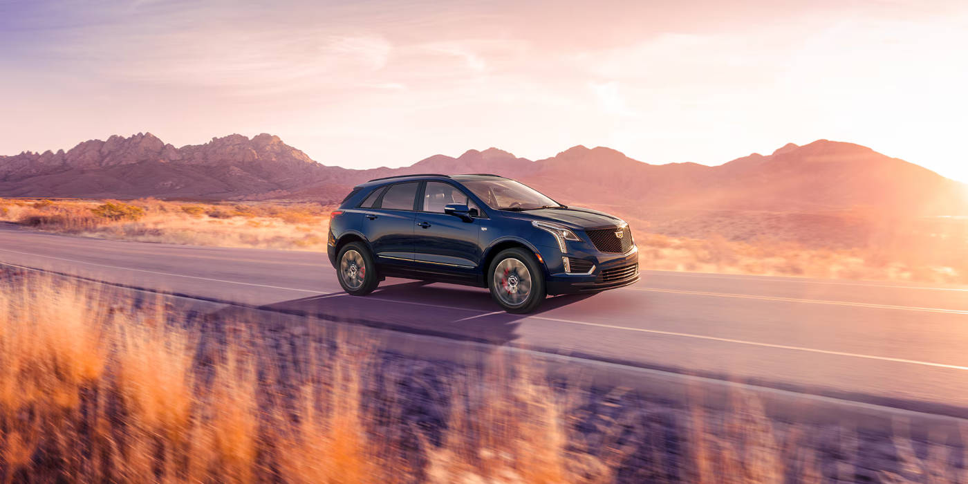 2025 Cadillac XT5 driving through the desert