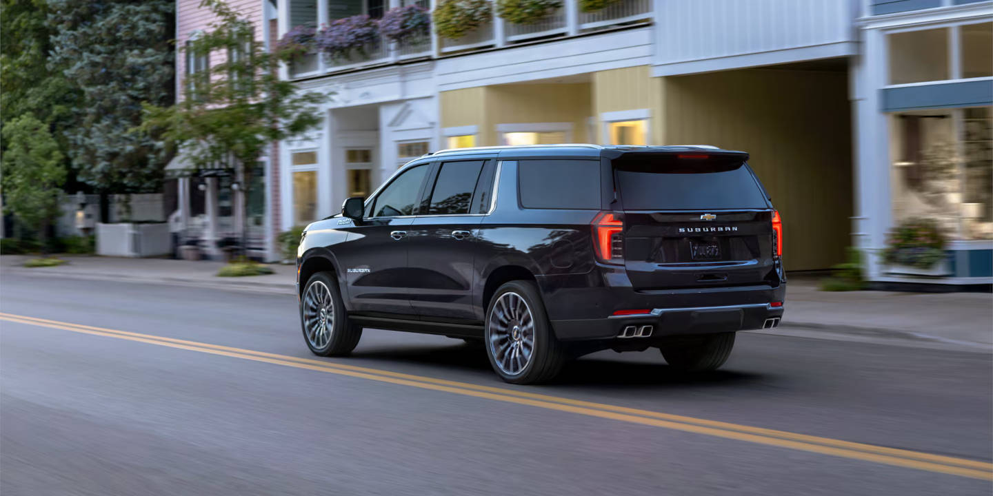 2025 Chevy Suburban driving through the city
