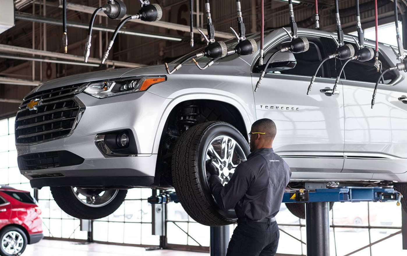 Chevy mechanic doing a tire rotation