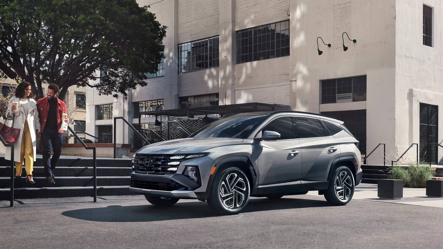 2025 Hyundai Tucson Plug-In Hybrid parked at a coffee shop
