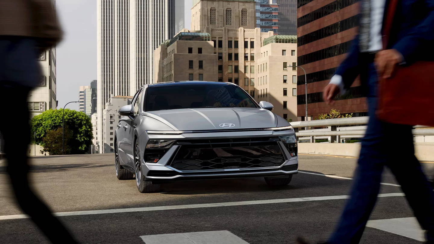 2025 Hyundai Sonata Hybrid stopped at a crosswalk