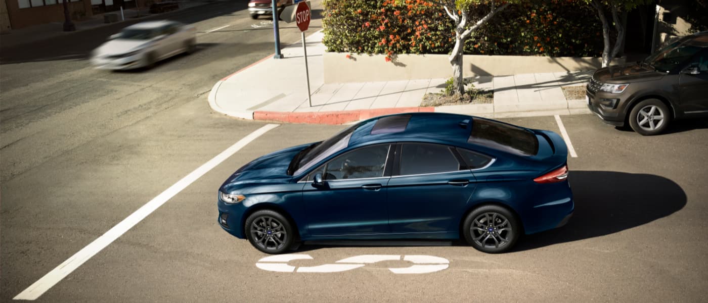 2020 Ford Fusion parked at a stop sign