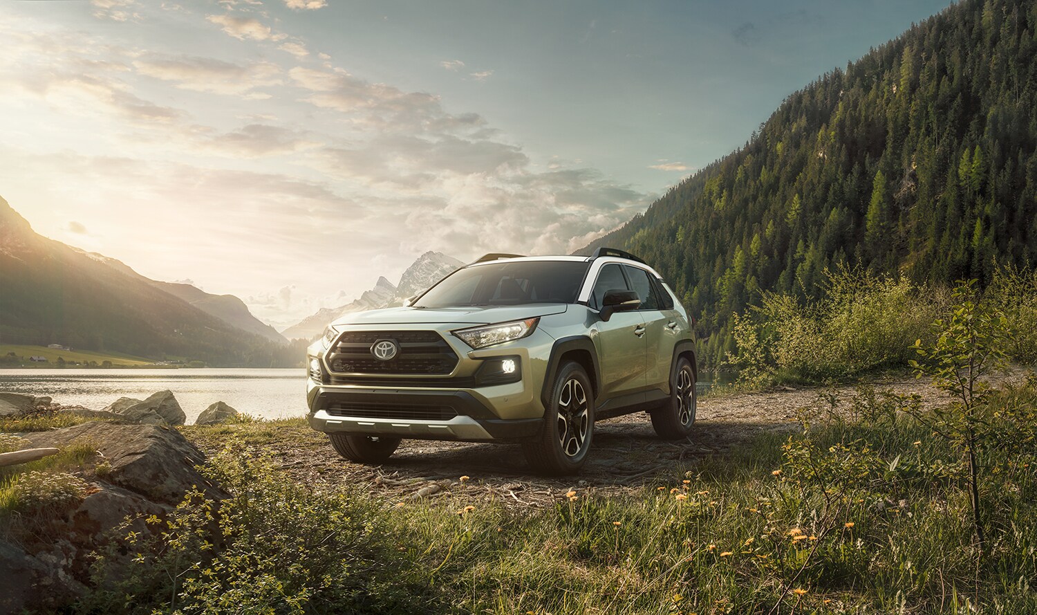 Tan Lake.jpg 2019 Toyota RAV4 parked by a scenic lake
