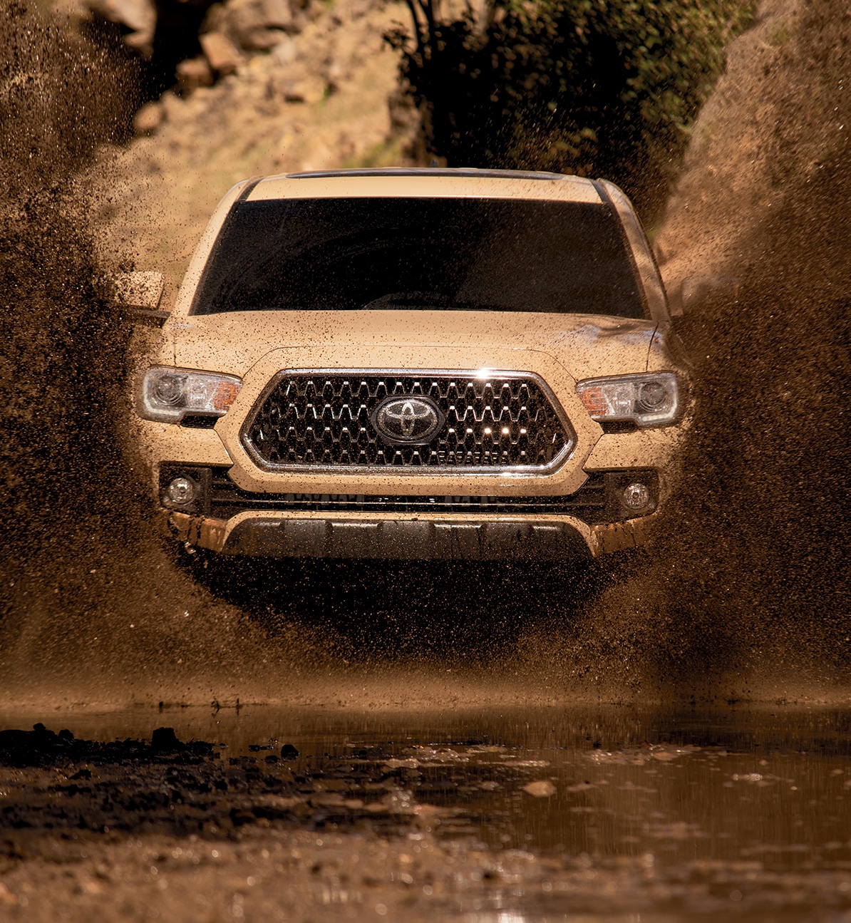 TacomaInMud.jpg 2019 Tacoma driving through muddy water