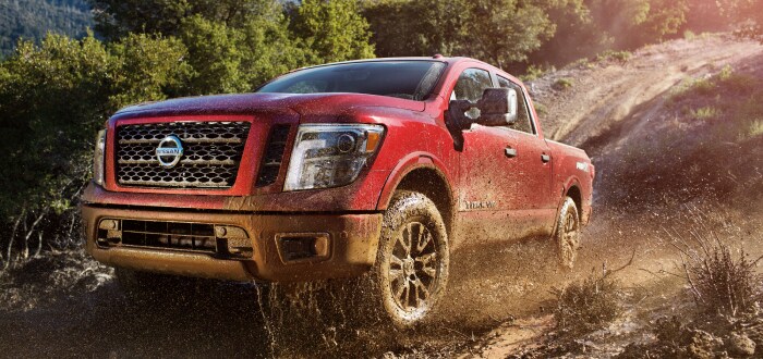 2019-Nissan-Titan-Pro4X-SingleCab-Truck-L01 (1) (1).jpg Nissan Titan Pro4X driving through the dirt