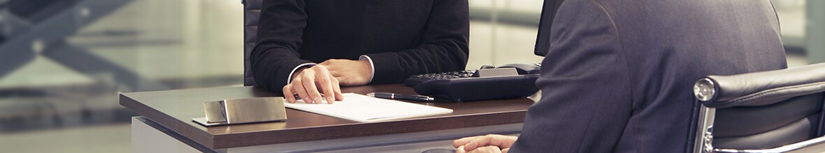 shutterstock_535943791.jpg Finance Handshake over the desk