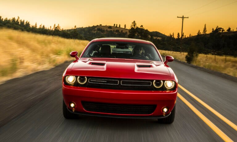 Dodge Challenger driving down country side