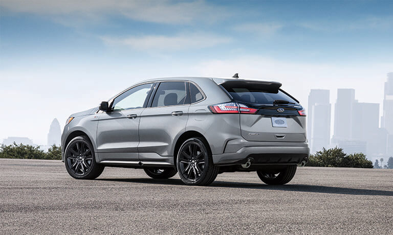 2022 Ford Edge parked in front of a city skyline