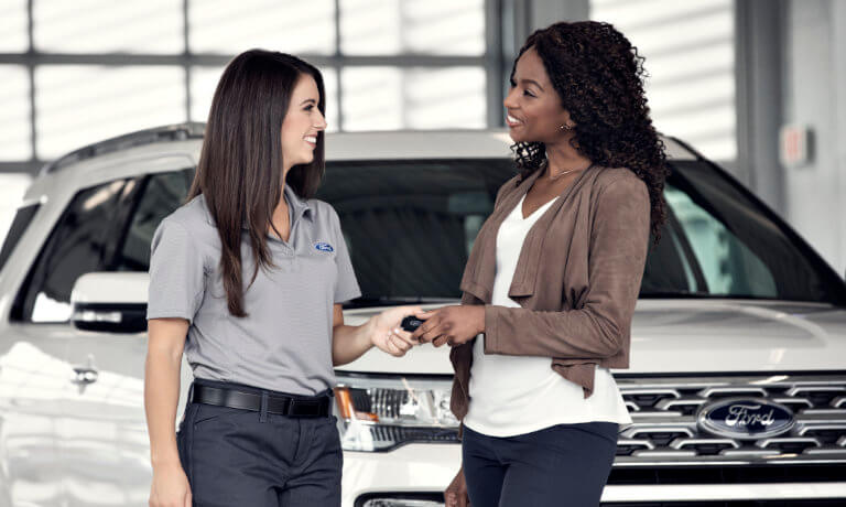Ford technician taking keys from driver