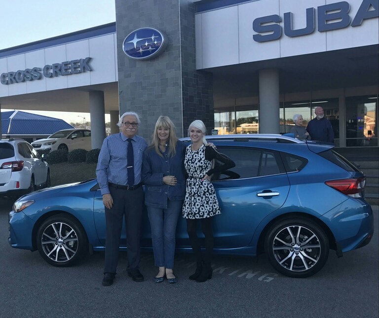 Ellen & Chester with Sales Advisor Ava and their new 2017 Impreza!.jpg