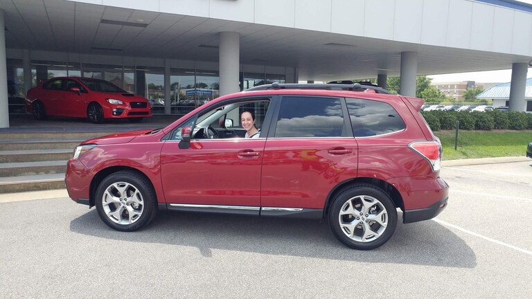 Amy with her new 2017 Forester.jpg