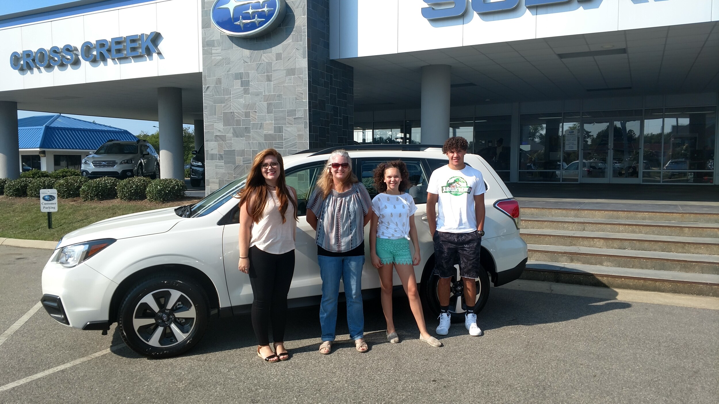 Amanda, Trenton, & Chelsea with Sr Sales Advisor Emily.jpg