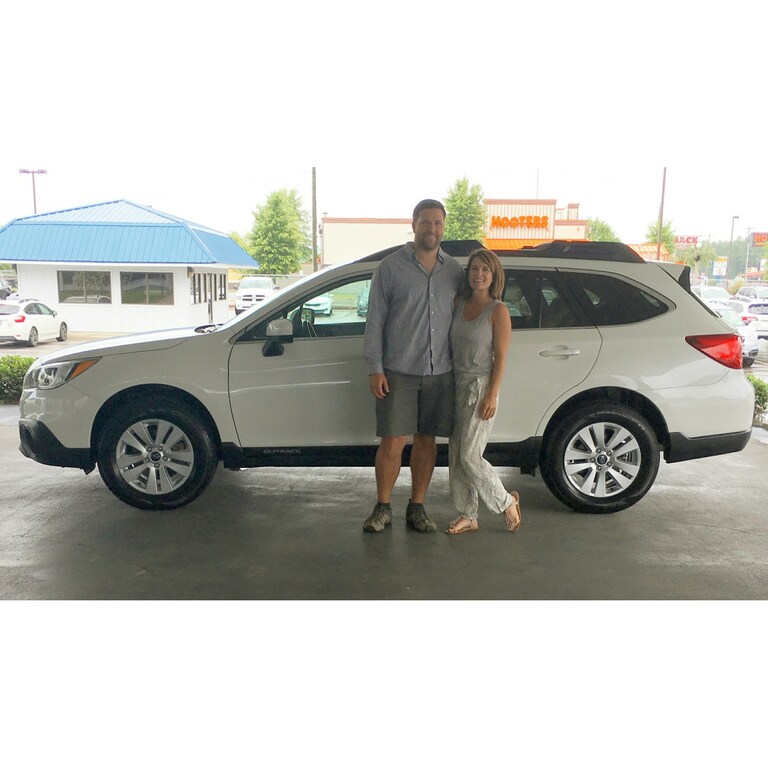 Mr & Mrs Norbury with their first Subaru - a 2015 CPO Outback.jpg