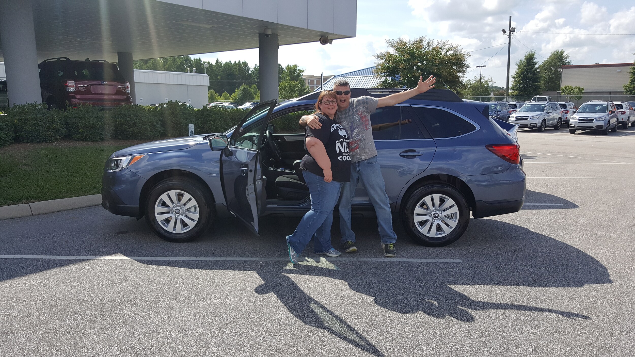 Lisa and Steven with their new 2017 Outback.jpg