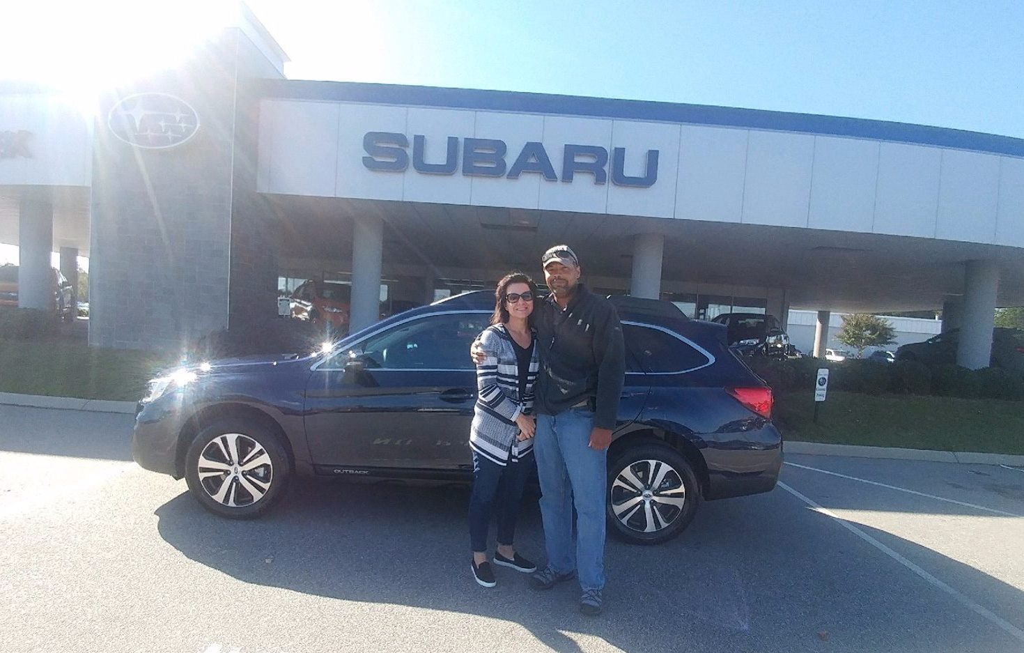 Mr & Mrs Elliot with their new Subaru Outback.jpg
