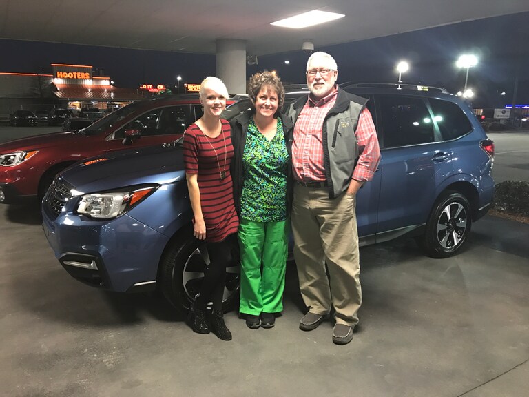 Mr & Mrs Bradian with Sales Advisor Ava in front of their new 2017 Forester 2.5i Limited.JPG