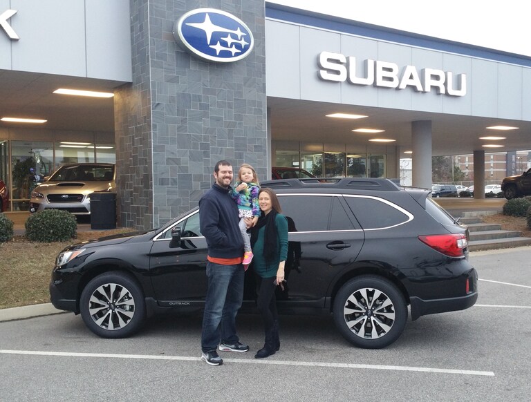 Mr & Mrs Staples having fun with their daughter after the purchase of their first Subaru - a 2017 Outback!.jpg