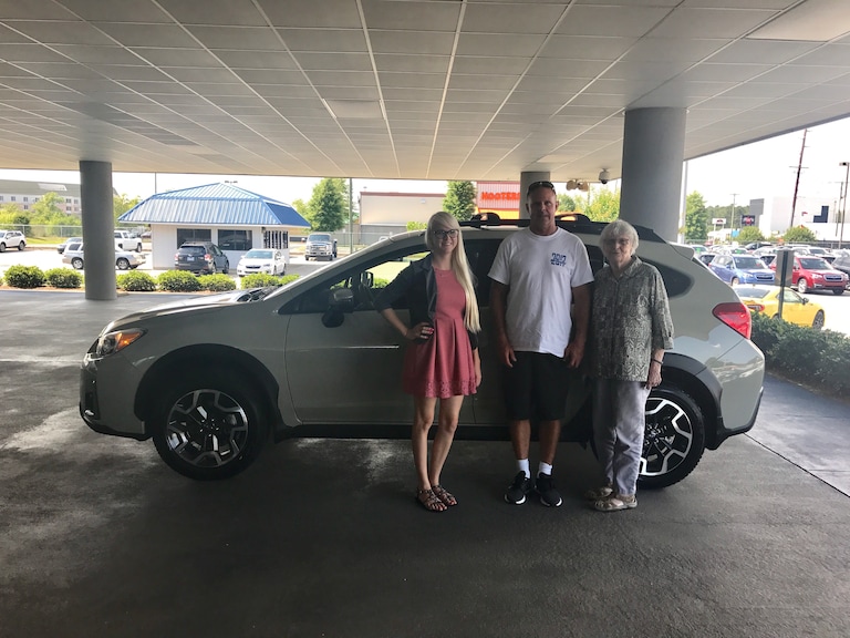 Maureen (R), her son, Ralph, and Sales Advisor, Ava, (L) in front of Maureen's new 2017 Crosstrek.JPG