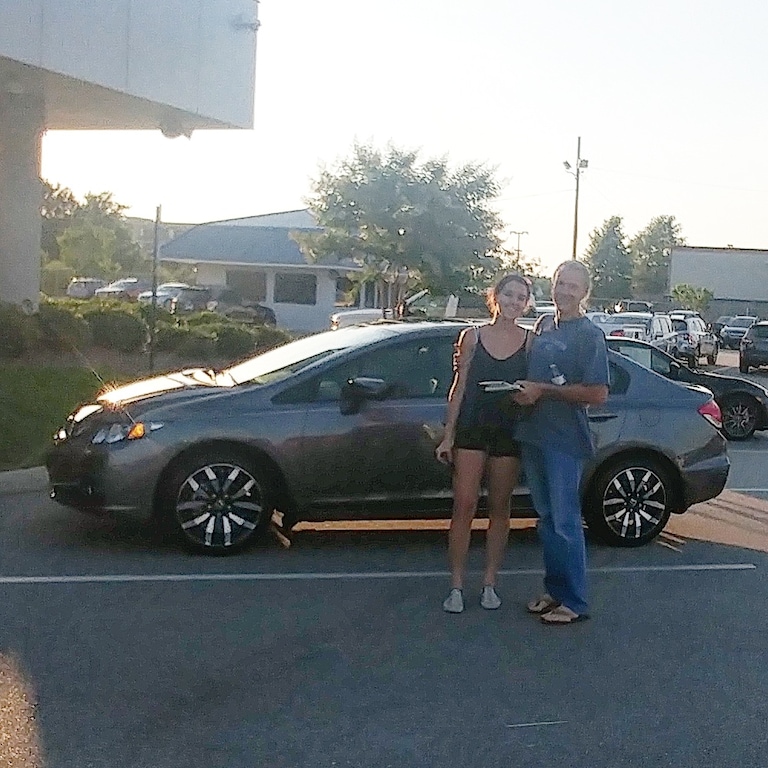 David with his daughter in front of the 2015 Honda Civic she will be driving to college this year!.jpg