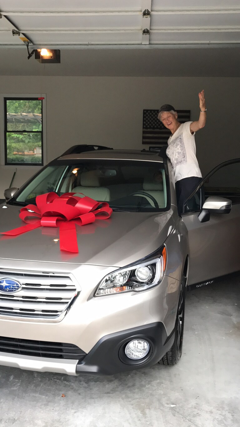 Marsha Howe with her new 2017 Subaru Outback.JPG