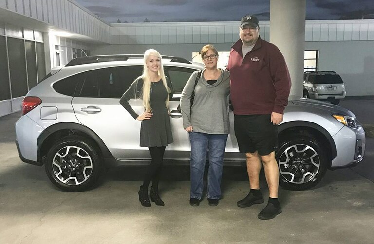 Bill & Shelby Kobe with their new 2017 Crosstrek.jpg